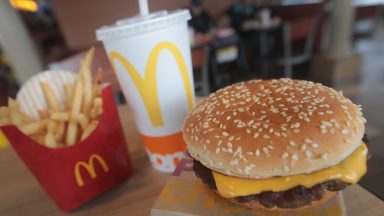 EFFINGHAM, IL - MARCH 30:  A Quarter Pounder hamburger is served at a McDonald's restaurant on March 30, 2017 in Effingham, Illinois. McDonald's announced today that it will start making the burger with fresh beef patties instead of the frozen beef that it currently uses.  (Photo Illustration by Scott Olson/Getty Images)