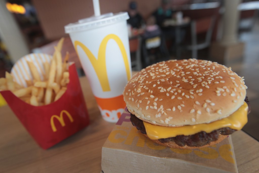 EFFINGHAM, IL - MARCH 30:  A Quarter Pounder hamburger is served at a McDonald's restaurant on March 30, 2017 in Effingham, Illinois. McDonald's announced today that it will start making the burger with fresh beef patties instead of the frozen beef that it currently uses.  (Photo Illustration by Scott Olson/Getty Images)